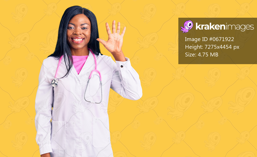 Young african american woman wearing doctor stethoscope showing and pointing up with fingers number five while smiling confident and happy. 