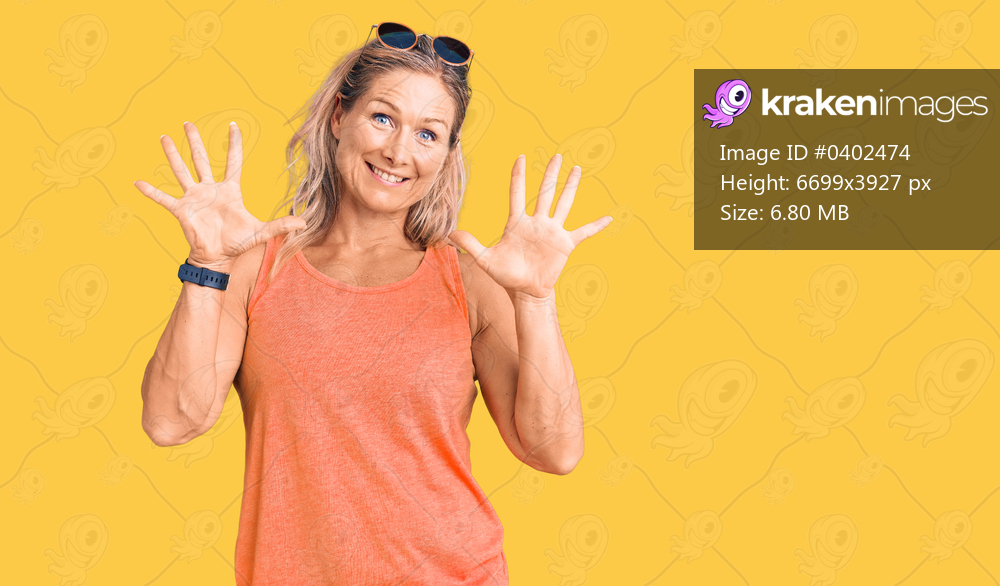 Middle age fit blonde woman wearing casual summer clothes and sunglasses showing and pointing up with fingers number ten while smiling confident and happy. 