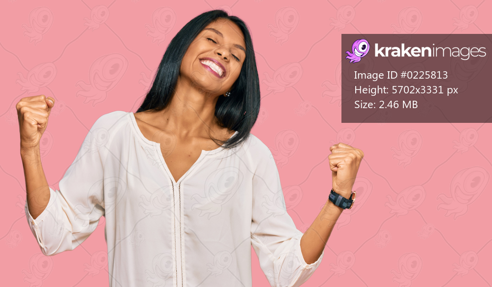 Young african american woman wearing casual clothes very happy and excited doing winner gesture with arms raised, smiling and screaming for success. celebration concept. 