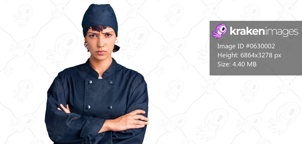 Young brunette woman with short hair wearing professional cook uniform skeptic and nervous, disapproving expression on face with crossed arms. negative person. 