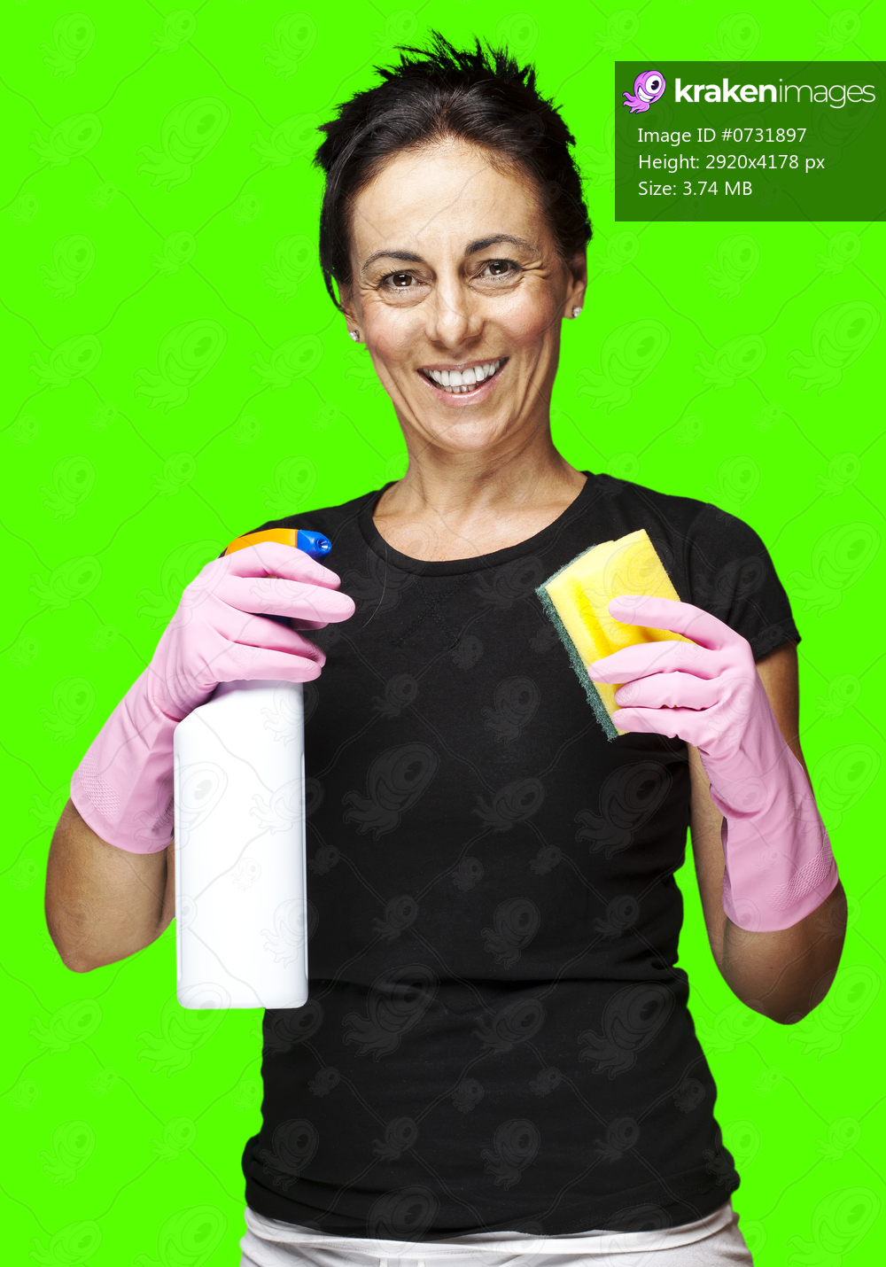 portrait of a middle aged woman cleaning against a removable chroma key background