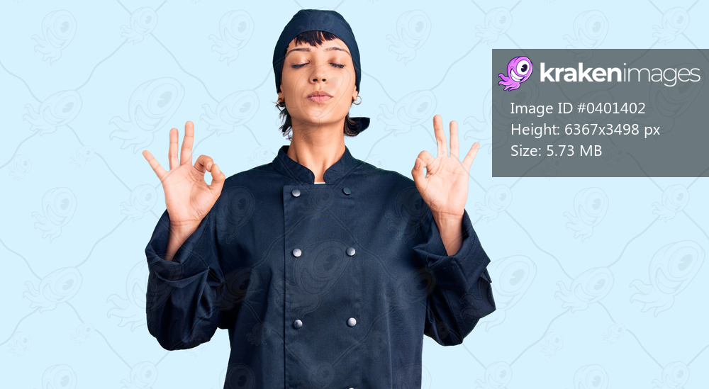 Young brunette woman with short hair wearing professional cook uniform relax and smiling with eyes closed doing meditation gesture with fingers. yoga concept. 