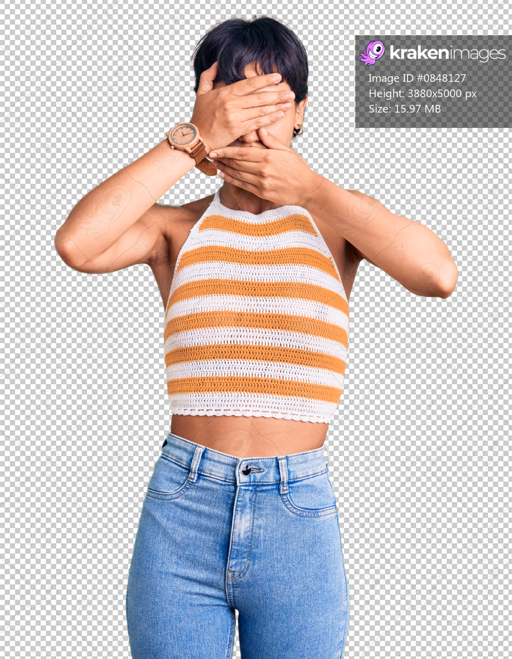 Young brunette woman with short hair wearing casual clothes covering eyes and mouth with hands, surprised and shocked. hiding emotion