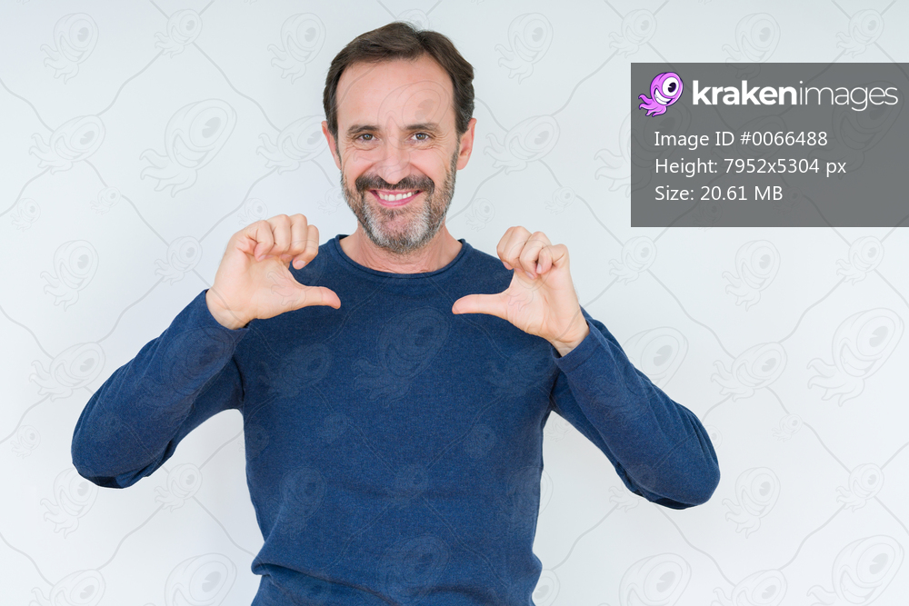 Elegant senior man over isolated background looking confident with smile on face, pointing oneself with fingers proud and happy.