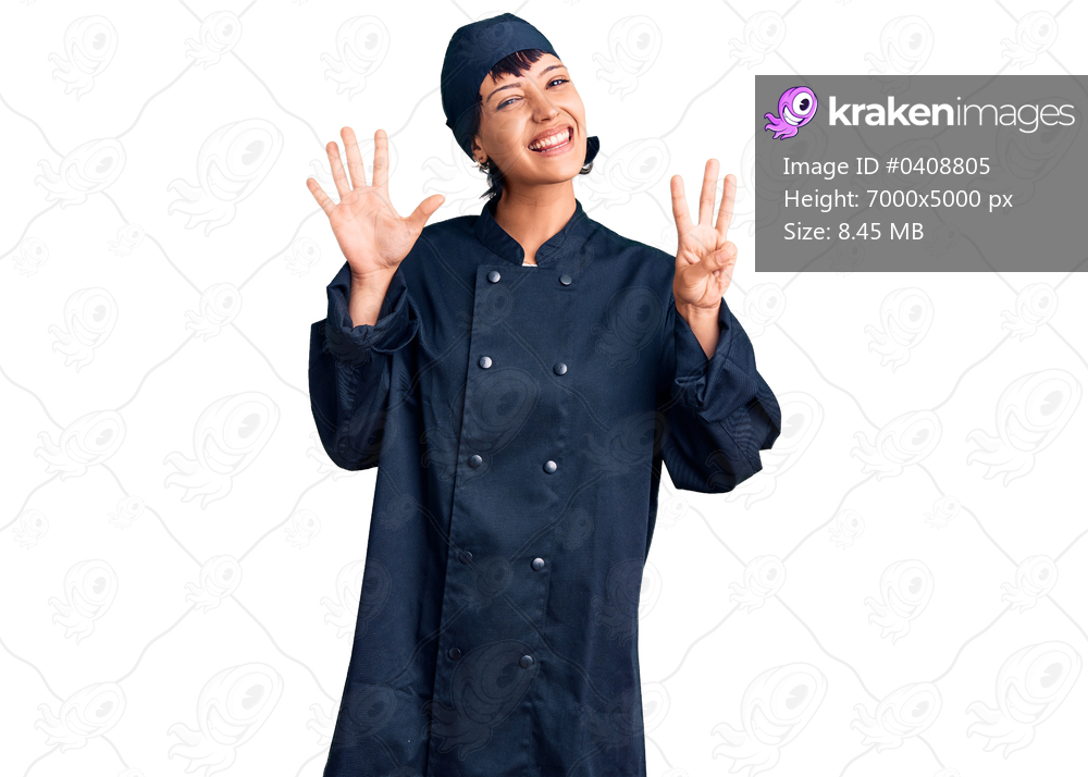 Young brunette woman with short hair wearing professional cook uniform showing and pointing up with fingers number eight while smiling confident and happy. 