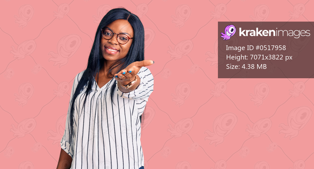 Young african american woman wearing casual clothes and glasses smiling cheerful offering palm hand giving assistance and acceptance. 
