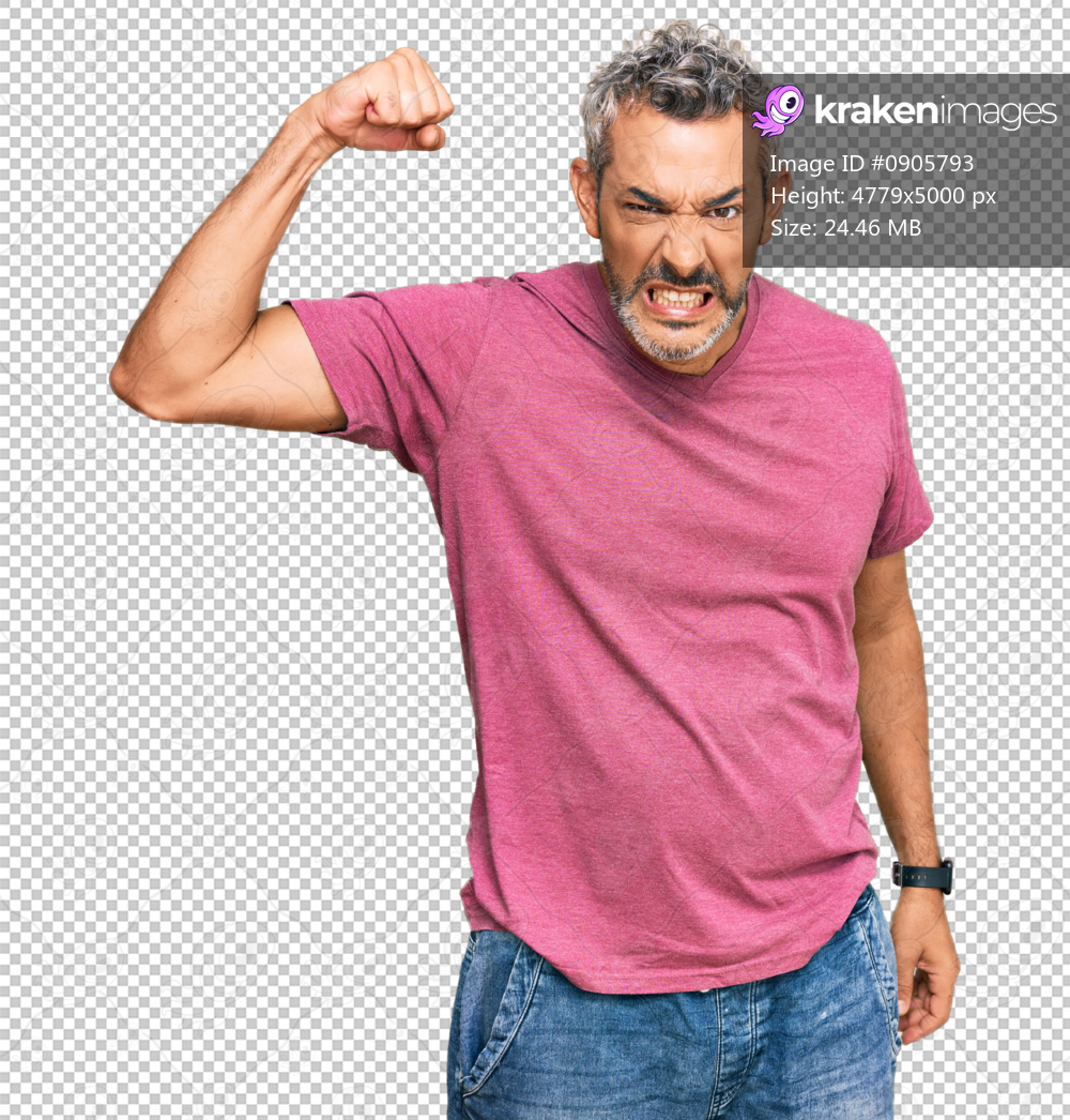 Middle age grey-haired man wearing casual clothes angry and mad raising fist frustrated and furious while shouting with anger. rage and aggressive concept.