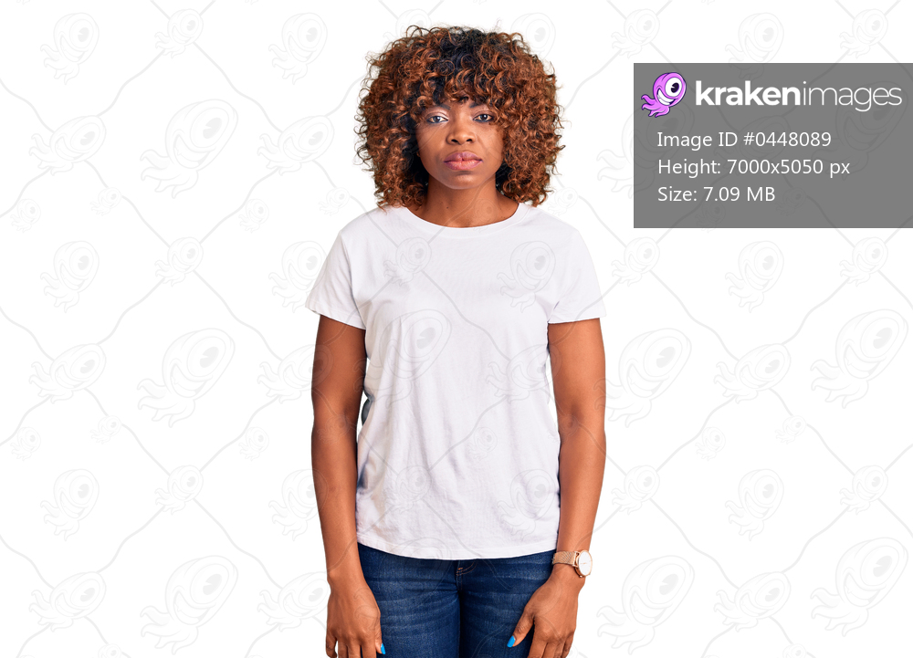 Young african american woman wearing casual white tshirt depressed and worry for distress, crying angry and afraid. sad expression. 