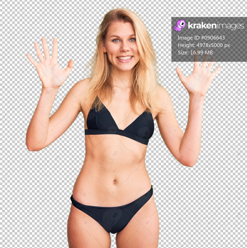 Young beautiful blonde woman wearing bikini showing and pointing up with fingers number ten while smiling confident and happy.