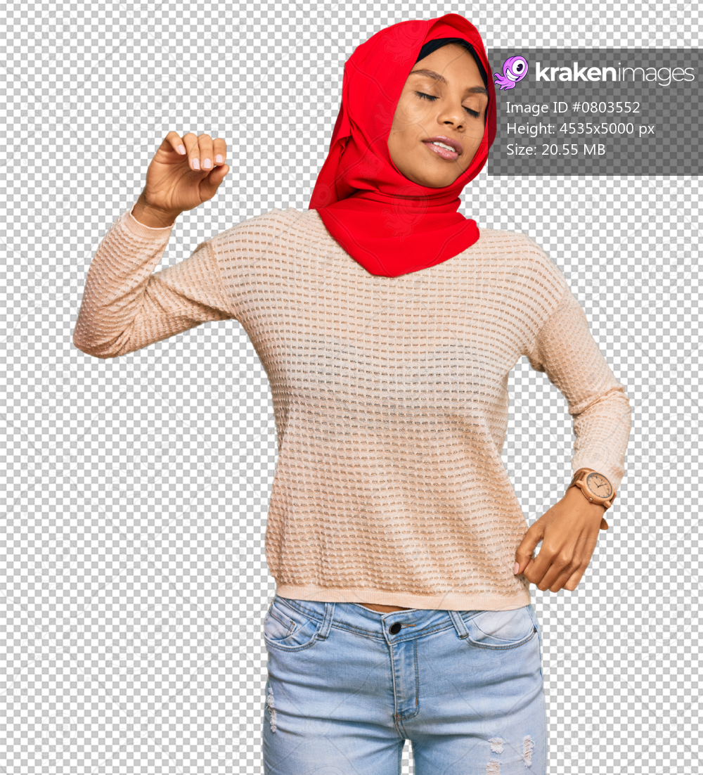 Young african american woman wearing traditional islamic hijab scarf stretching back, tired and relaxed, sleepy and yawning for early morning