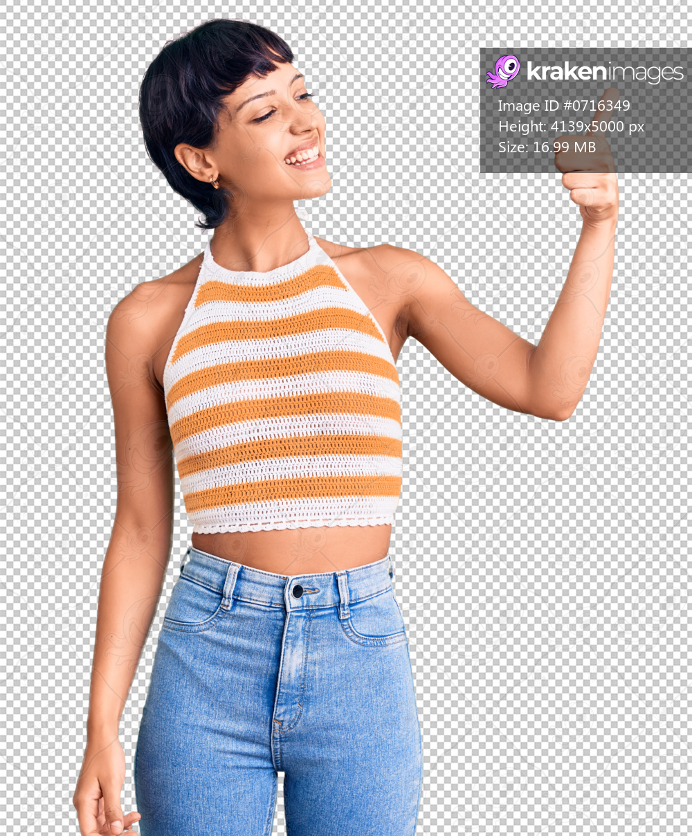 Young brunette woman with short hair wearing casual clothes looking proud, smiling doing thumbs up gesture to the side