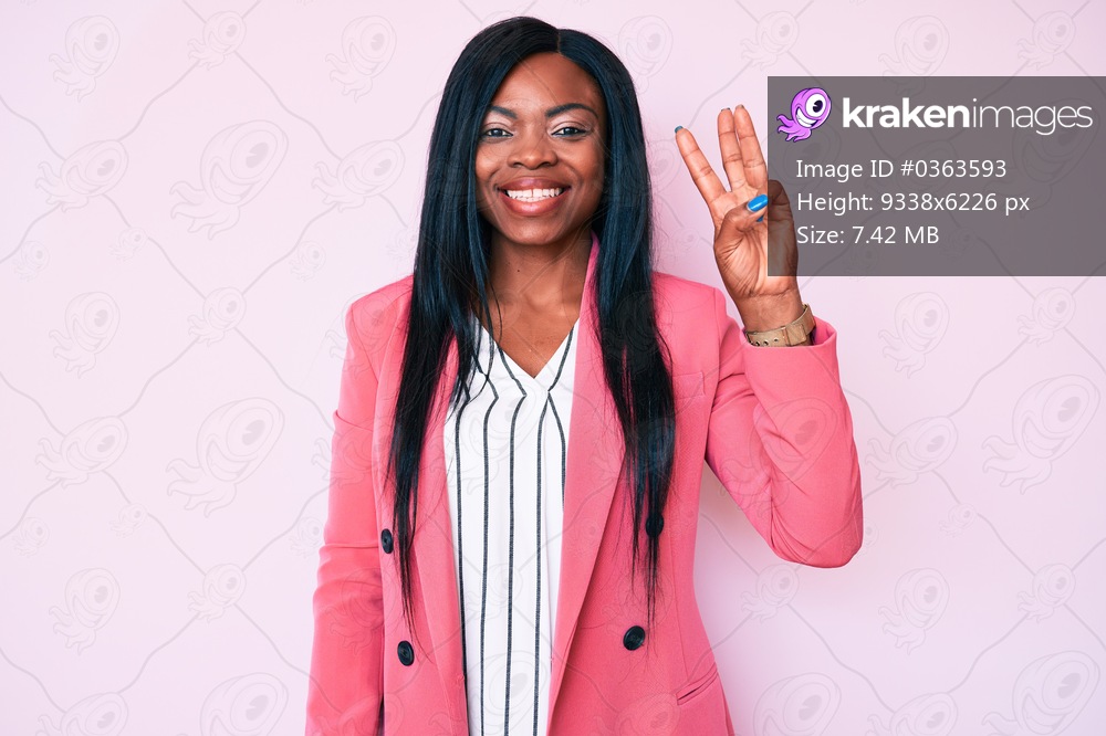 Young african american woman wearing business clothes showing and pointing up with fingers number three while smiling confident and happy. 