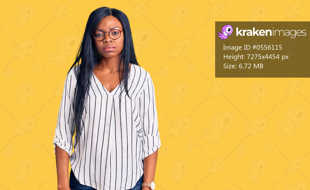 Young african american woman wearing casual clothes and glasses depressed and worry for distress, crying angry and afraid. sad expression. 