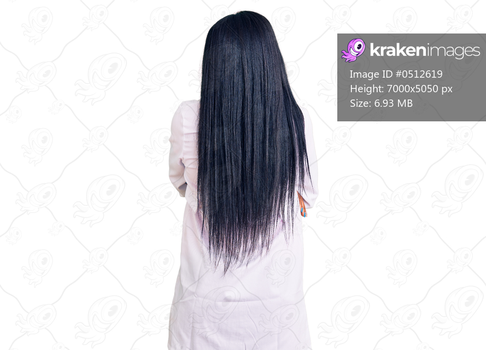 Young african american woman wearing doctor stethoscope standing backwards looking away with crossed arms 