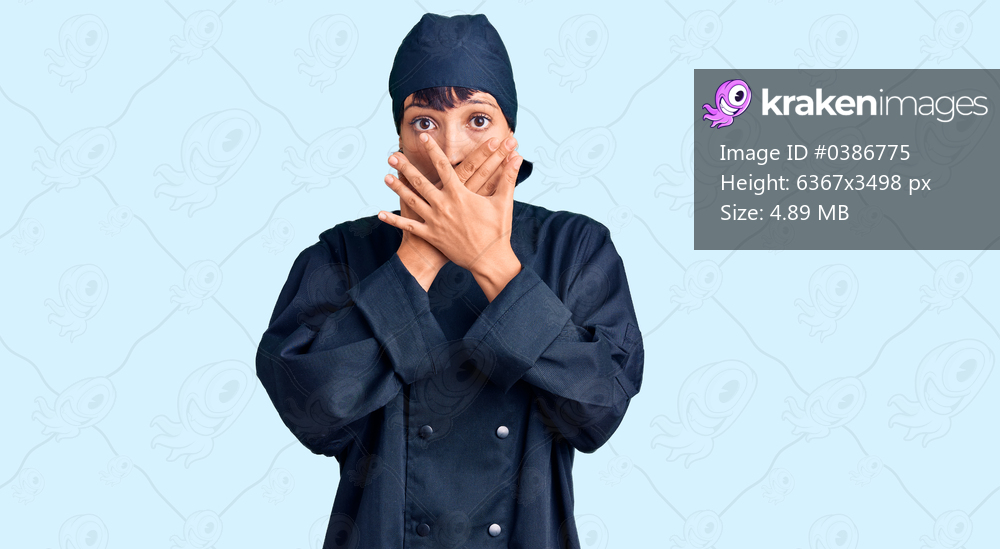 Young brunette woman with short hair wearing professional cook uniform shocked covering mouth with hands for mistake. secret concept. 