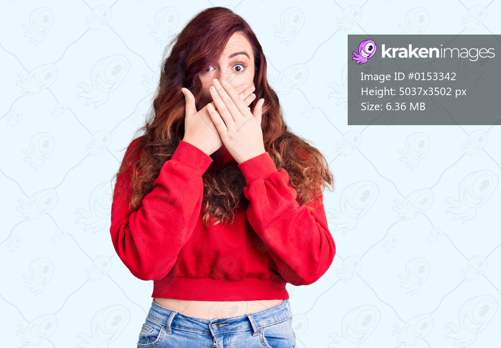 Young beautiful woman wearing casual winter sweater shocked covering mouth with hands for mistake. secret concept. 
