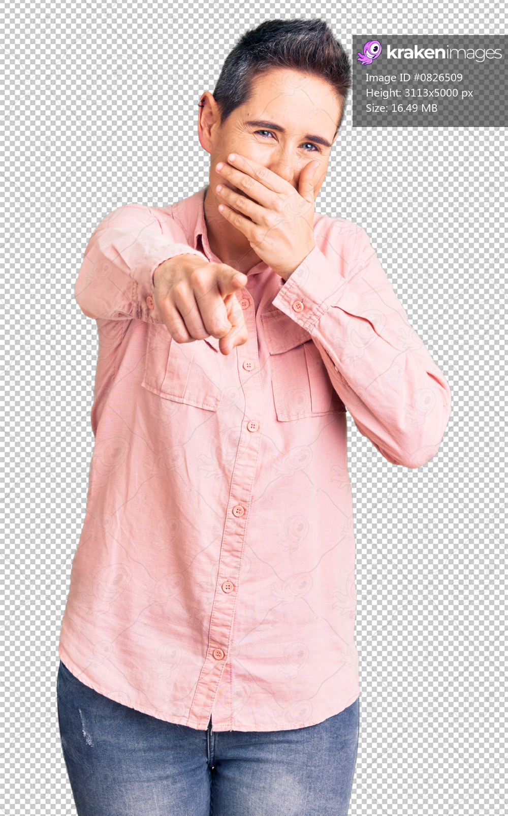 Young woman with short hair wearing casual clothes laughing at you, pointing finger to the camera with hand over mouth, shame expression