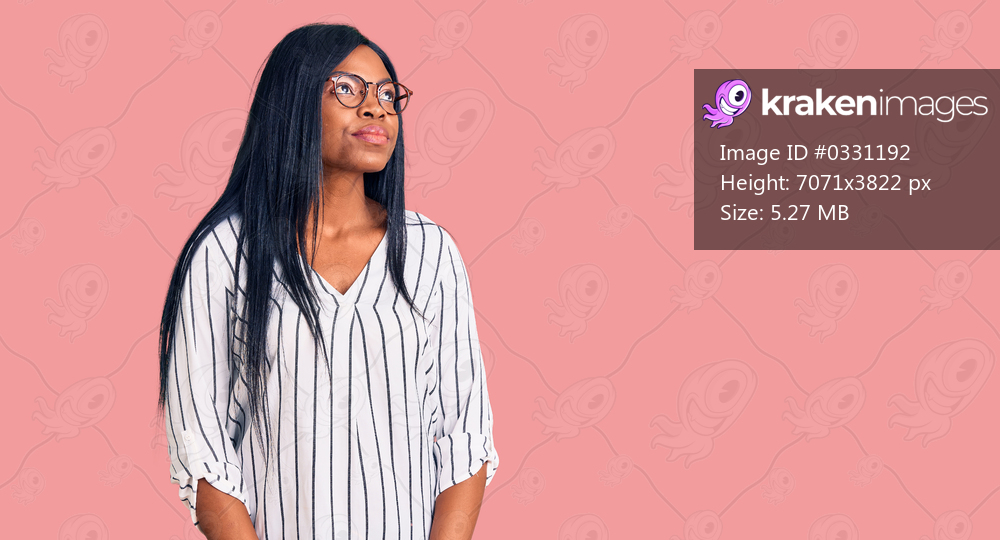 Young african american woman wearing casual clothes and glasses smiling looking to the side and staring away thinking. 