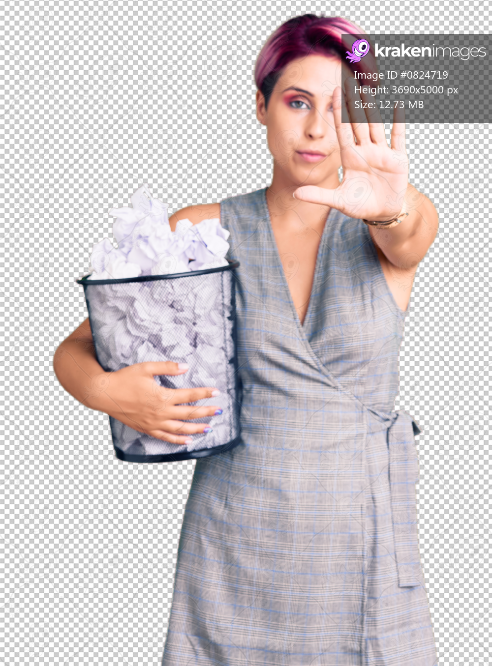 Young beautiful woman with pink hair holding paper bin full of crumpled papers with open hand doing stop sign with serious and confident expression, defense gesture