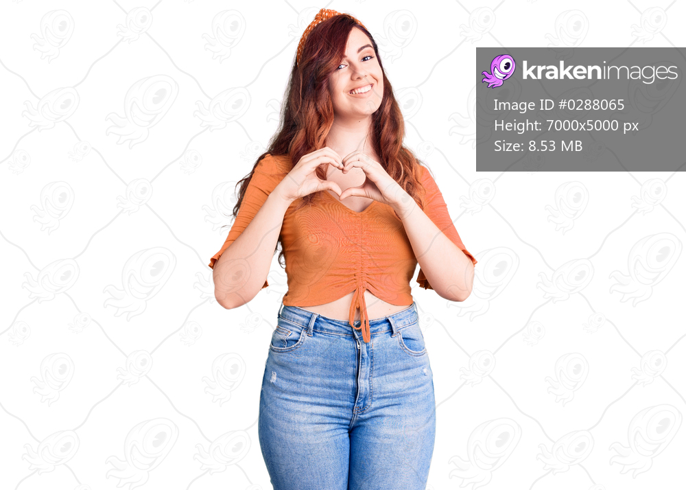 Young beautiful woman wearing casual clothes smiling in love showing heart symbol and shape with hands. romantic concept. 