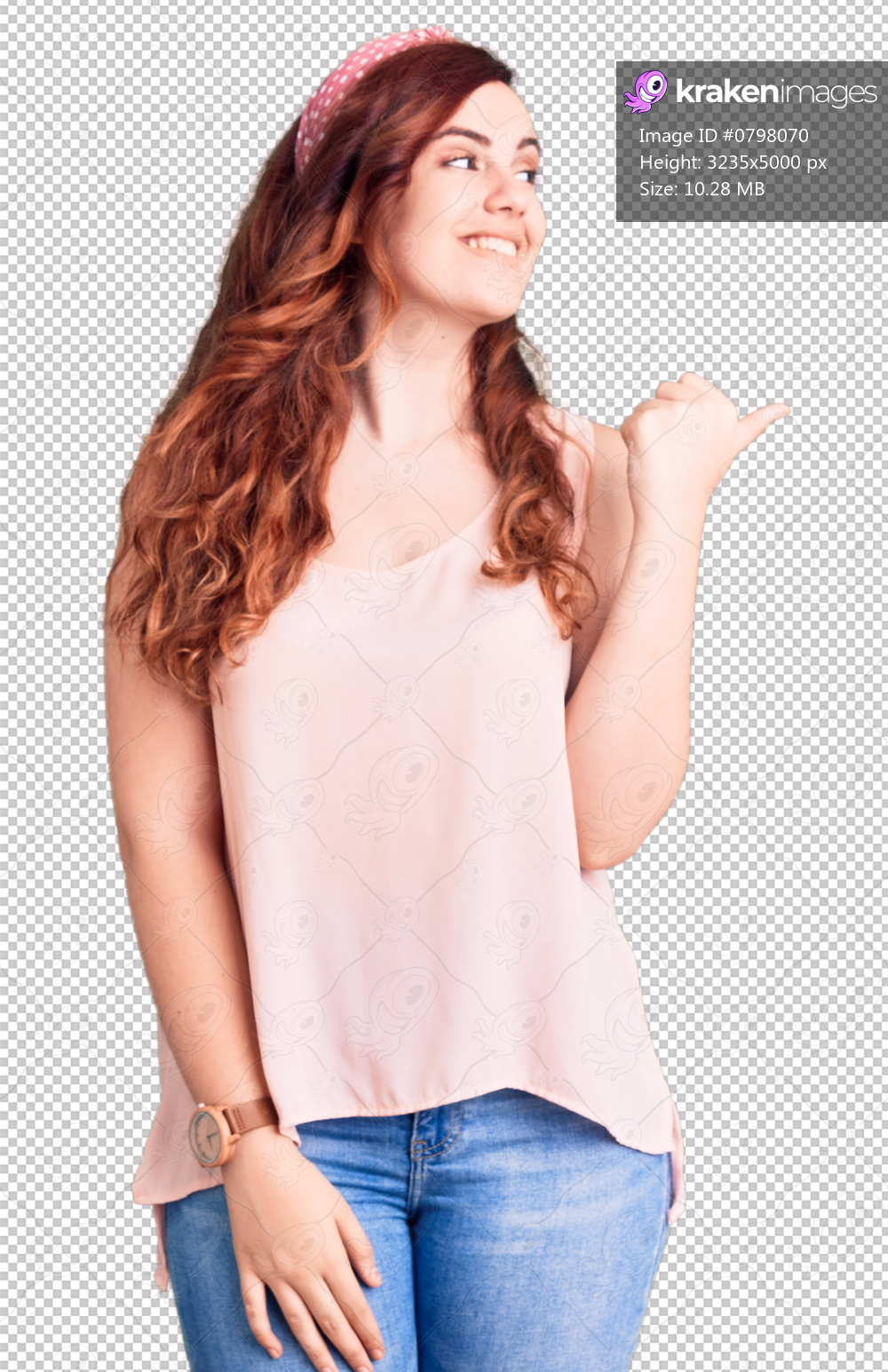 Young beautiful woman wearing casual clothes and diadem smiling with happy face looking and pointing to the side with thumb up.
