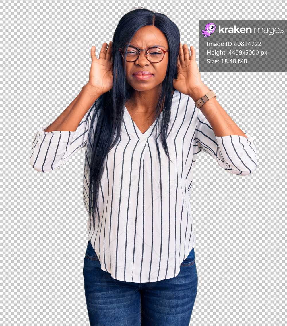 Young african american woman wearing casual clothes and glasses trying to hear both hands on ear gesture, curious for gossip. hearing problem, deaf