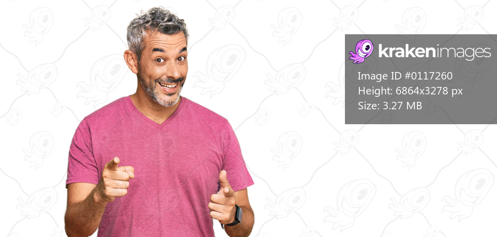 Middle age grey-haired man wearing casual clothes pointing fingers to camera with happy and funny face. good energy and vibes. 