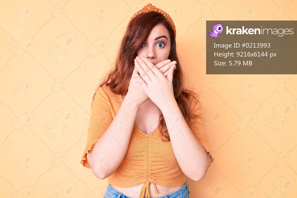 Young beautiful woman wearing casual clothes shocked covering mouth with hands for mistake. secret concept. 