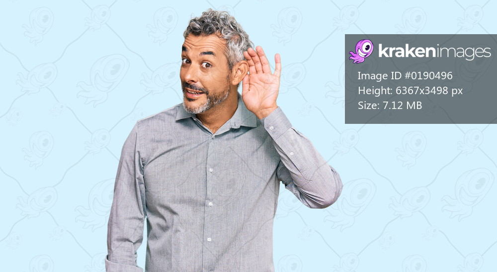 Middle age grey-haired man wearing casual clothes smiling with hand over ear listening an hearing to rumor or gossip. deafness concept. 