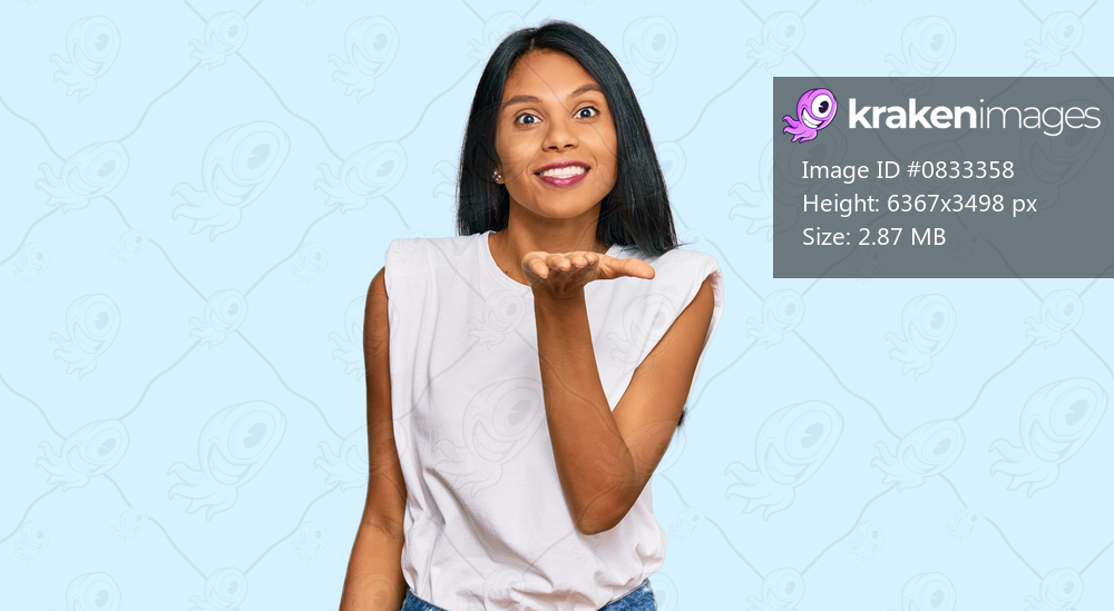 Young african american woman wearing casual clothes looking at the camera blowing a kiss with hand on air being lovely and sexy. love expression. 