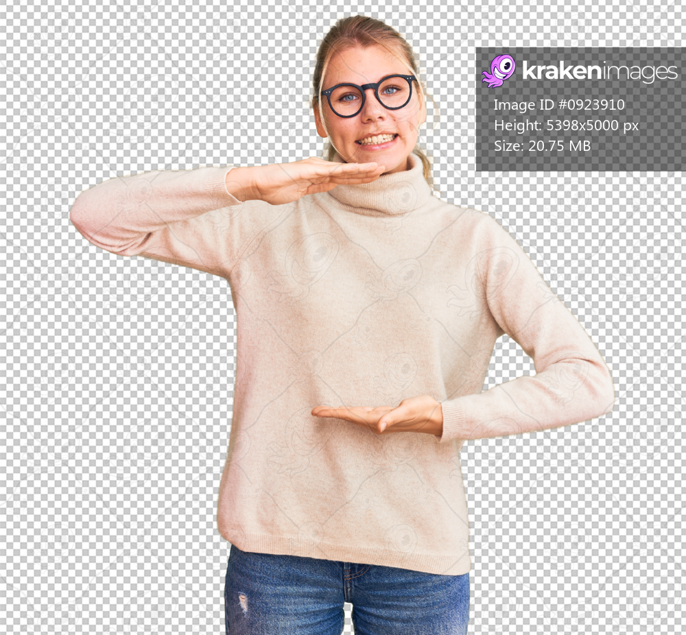 Young beautiful blonde woman wearing turtleneck sweater and glasses gesturing with hands showing big and large size sign, measure symbol. smiling looking at the camera. measuring concept.