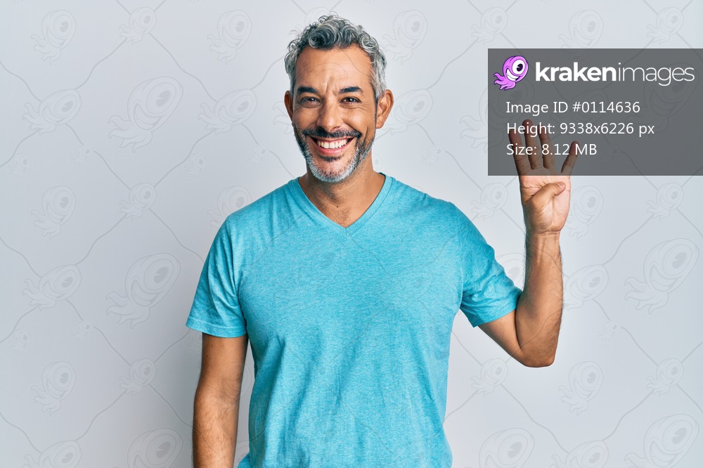 Middle age grey-haired man wearing casual clothes showing and pointing up with fingers number four while smiling confident and happy. 