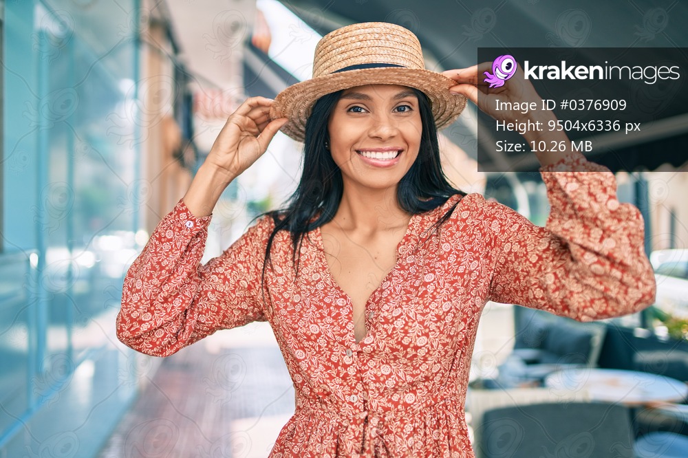 Young african american tourist woman on vacation smiling happy walking at the city.
