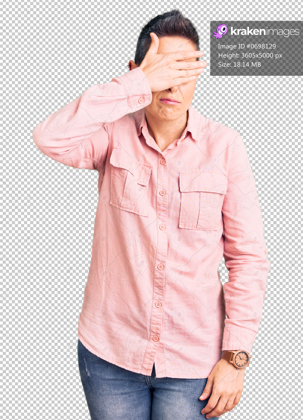 Young woman with short hair wearing casual clothes covering eyes with hand, looking serious and sad. sightless, hiding and rejection concept