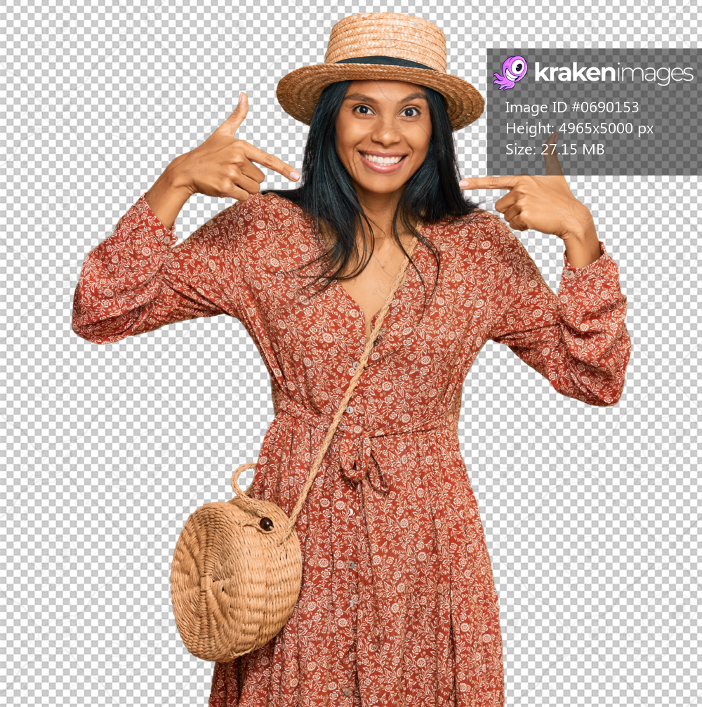 Young african american woman wearing summer hat looking confident with smile on face, pointing oneself with fingers proud and happy.