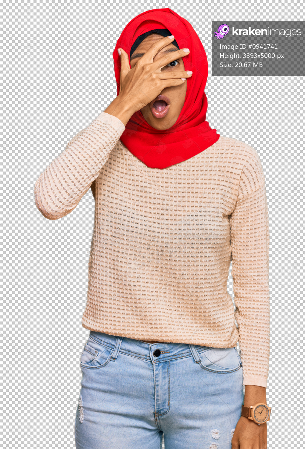 Young african american woman wearing traditional islamic hijab scarf peeking in shock covering face and eyes with hand, looking through fingers with embarrassed expression.