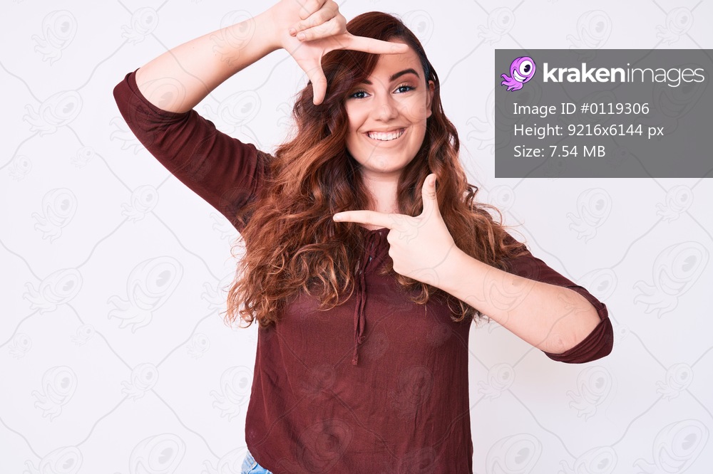 Young beautiful woman wearing casual clothes smiling making frame with hands and fingers with happy face. creativity and photography concept. 