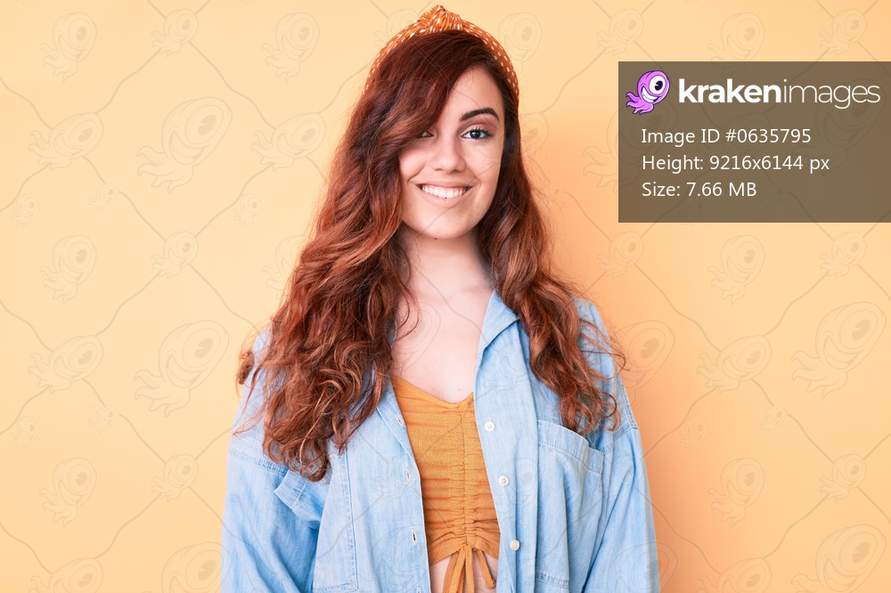 Young beautiful woman wearing casual clothes with a happy and cool smile on face. lucky person. 