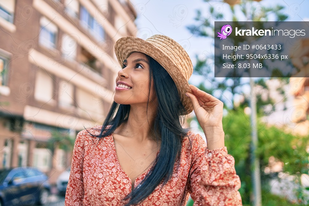 Young african american tourist woman on vacation smiling happy walking at the city.