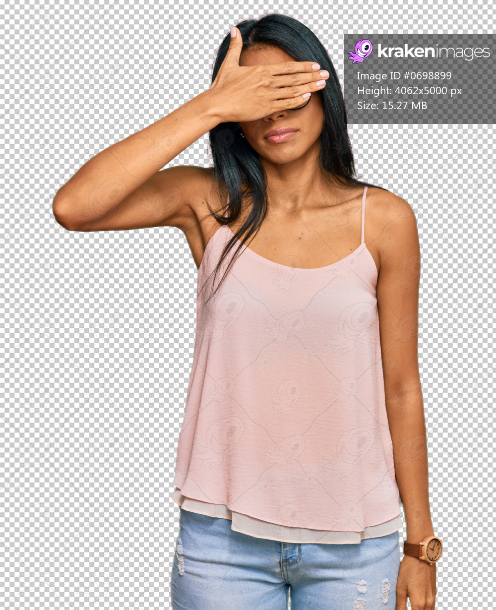 Young african american woman wearing casual clothes and glasses covering eyes with hand, looking serious and sad. sightless, hiding and rejection concept