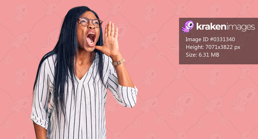 Young african american woman wearing casual clothes and glasses shouting and screaming loud to side with hand on mouth. communication concept. 