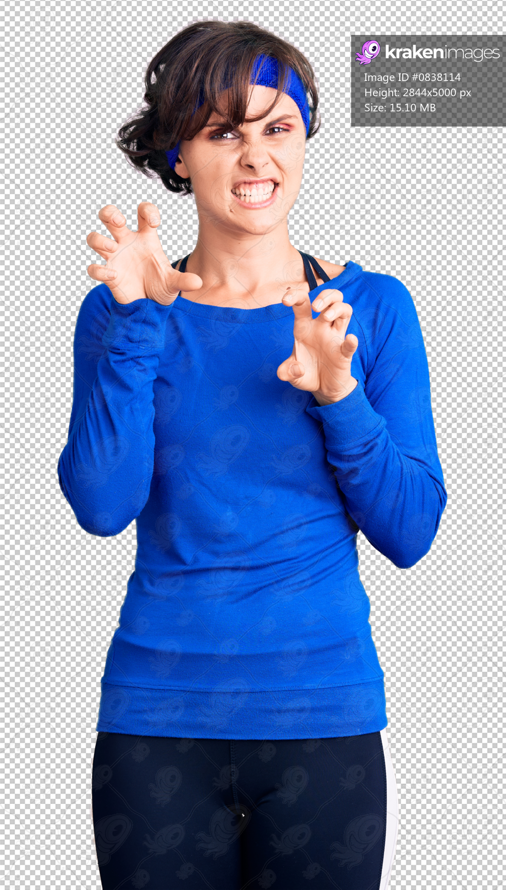 Beautiful young woman with short hair wearing training workout clothes smiling funny doing claw gesture as cat, aggressive and sexy expression
