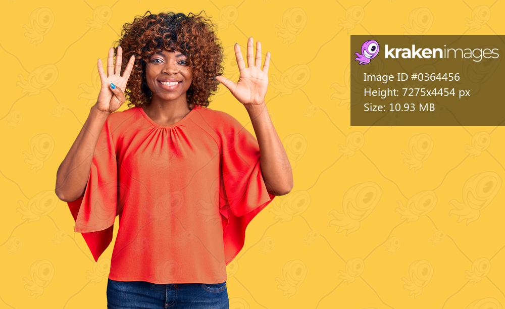 Young african american woman wearing casual clothes showing and pointing up with fingers number nine while smiling confident and happy. 