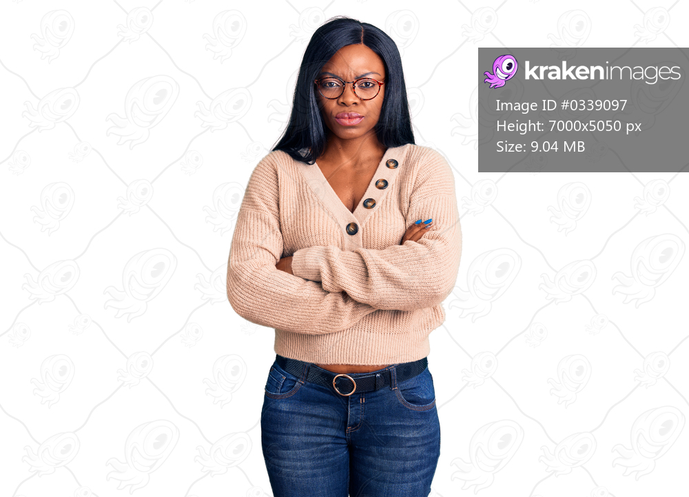 Young african american woman wearing casual clothes skeptic and nervous, disapproving expression on face with crossed arms. negative person. 