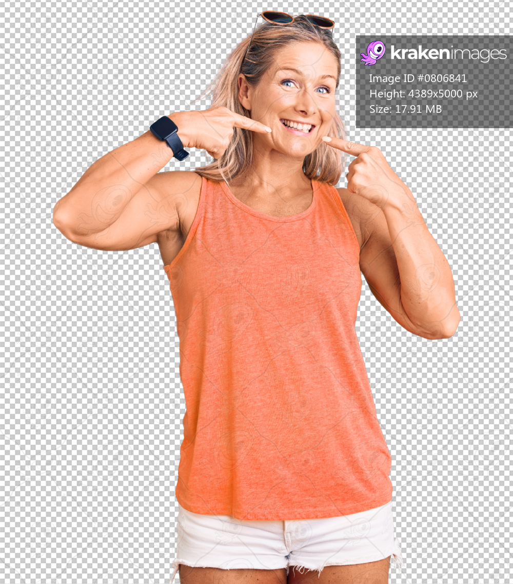 Middle age fit blonde woman wearing casual summer clothes and sunglasses smiling cheerful showing and pointing with fingers teeth and mouth. dental health concept.