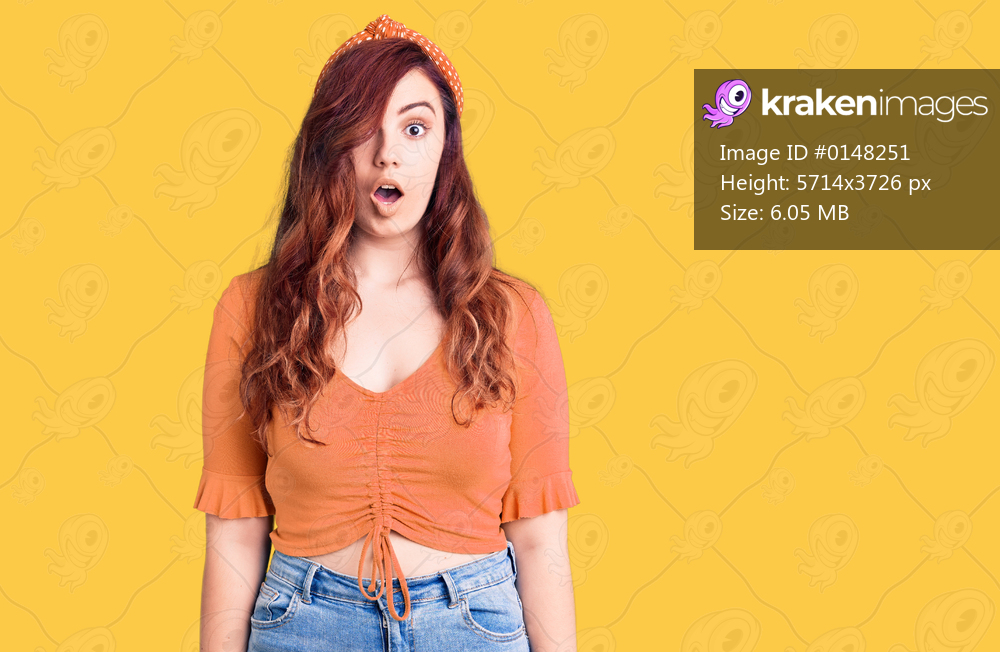 Young beautiful woman wearing casual clothes scared and amazed with open mouth for surprise, disbelief face 