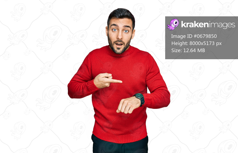 Young hispanic man wearing casual clothes in hurry pointing to watch time, impatience, upset and angry for deadline delay 