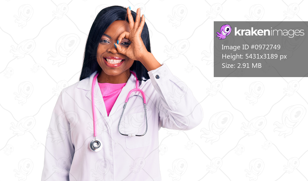Young african american woman wearing doctor stethoscope doing ok gesture with hand smiling, eye looking through fingers with happy face. 