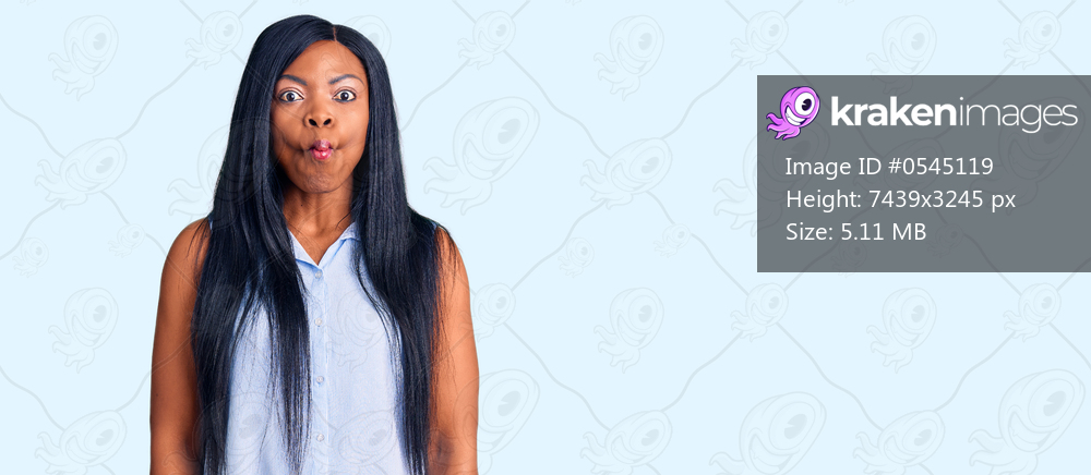 Young african american woman wearing casual clothes making fish face with lips, crazy and comical gesture. funny expression. 