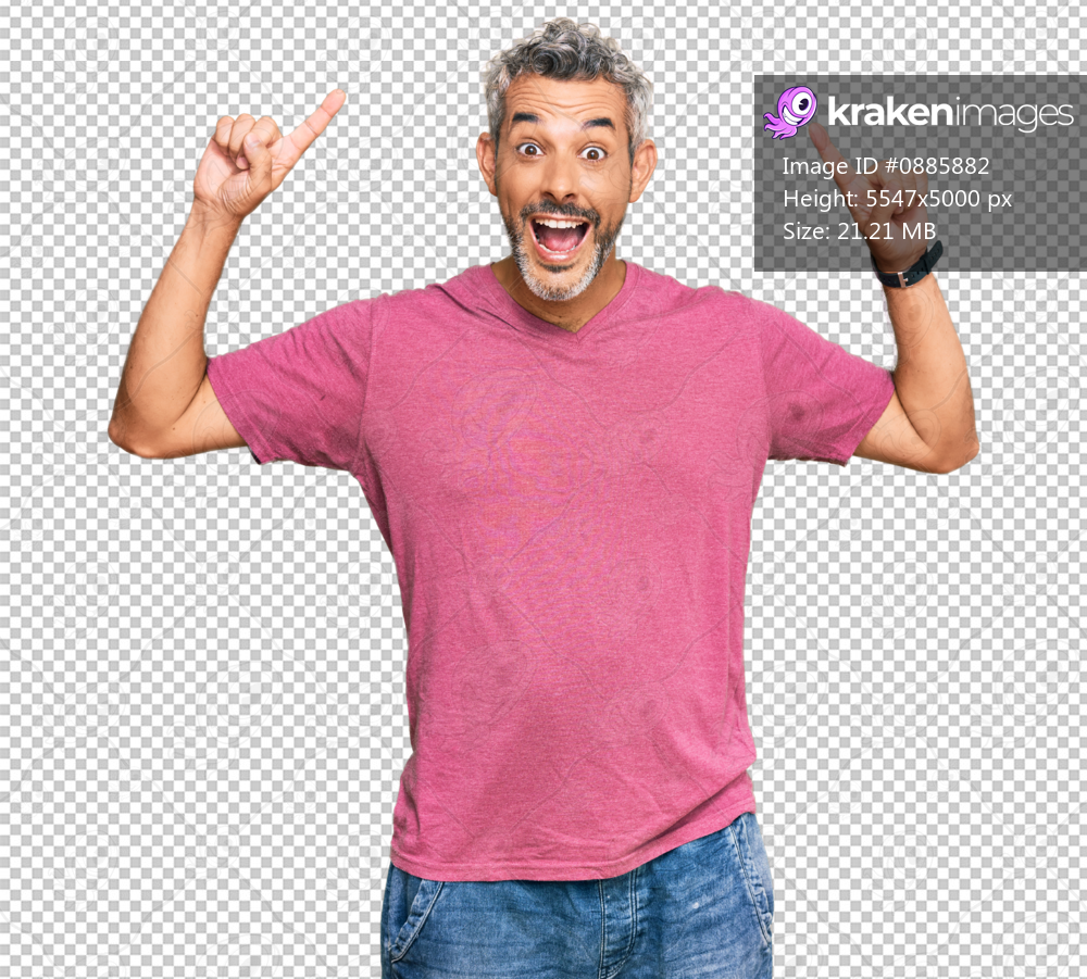 Middle age grey-haired man wearing casual clothes smiling amazed and surprised and pointing up with fingers and raised arms.